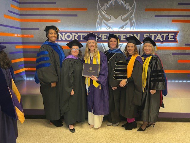 Social work graduate group photo.